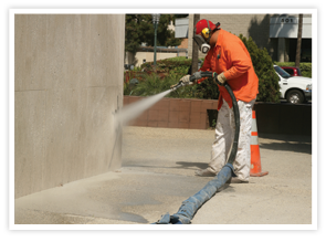 Sand Blasting a building